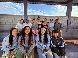 Lia Liao with the Saint Joseph water polo community